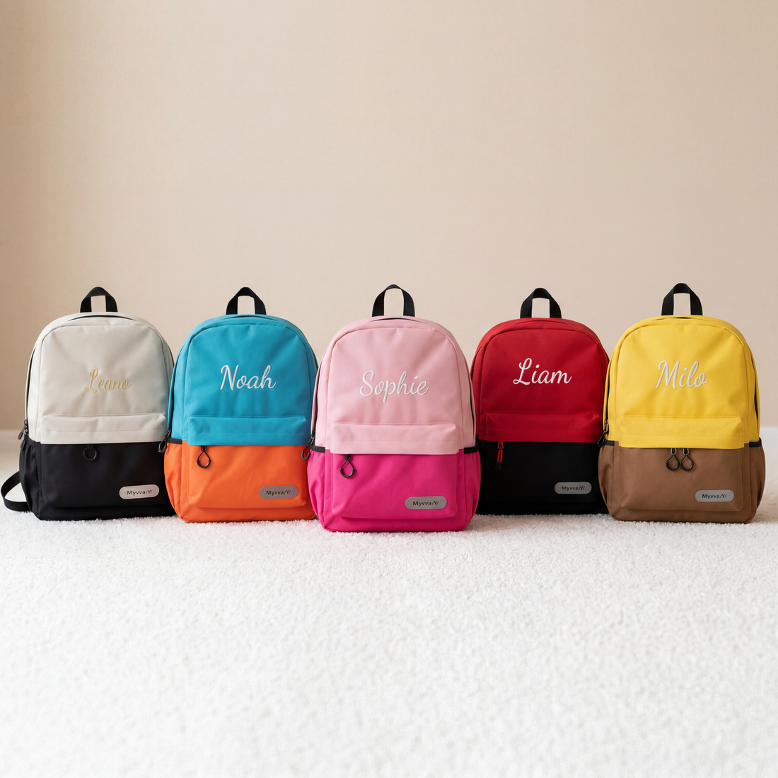 Custom name school backpacks for kids in five colour-block combinations with embroidered script names